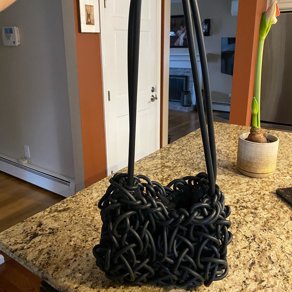 NEO brand black neoprene tube woven crossbody or shoulder bag